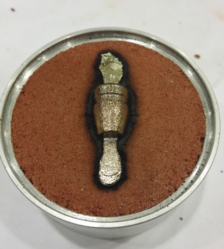 silver-bullet-casting-still-in-mold